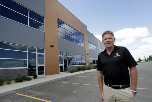 Drew Bayes, president and CEO of First General Services (Winnipeg) Ltd., in front of a new, as-yet-unoccupied industrial building in which First General will be an anchor tenant. Its leased about 15,000 square feet in the 35,000-square-foot building, and hopes to move in early in 2015. Murray McNeill story. Wayne Glowacki / Winnipeg Free Press July 23  2014