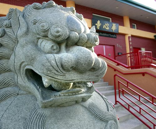 News reports say a  bronze decorative incense urn was stolen from the front of the Huasing Buddhist Temple on Cumberland Ave.  (The urn was by the front doors at right.) Wayne Glowacki / Winnipeg Free Press July 24  2014