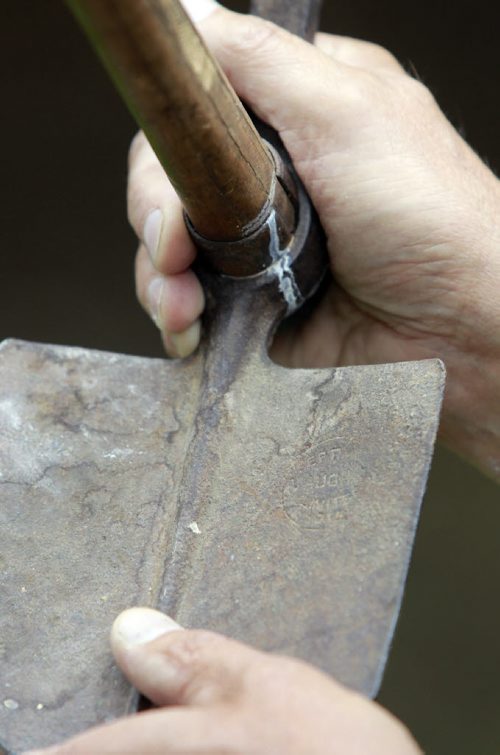 49.8    Rick Weind has a vintage shovel (showing the stamp) which infantry troops were given to dig trenches and foxholes during the First World War. Kevin Rollason story.  Wayne Glowacki / Winnipeg Free Press July 24  2014