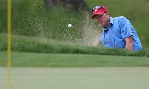 Todd Fanning shoots out of the bunker during the Men's Amateur Golf Championships at Niakwa Country Club, Tuesday, July 24, 2014. (TREVOR HAGAN/WINNIPEG FREE PRESS)