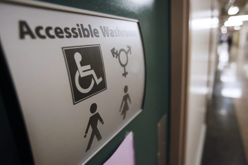 July 24, 2014 - 140724  -  "Accessible Washroom" signage posted at a washroom at the University of Winnipeg in Winnipeg Thursday, July 24, 2014.  John Woods / Winnipeg Free Press