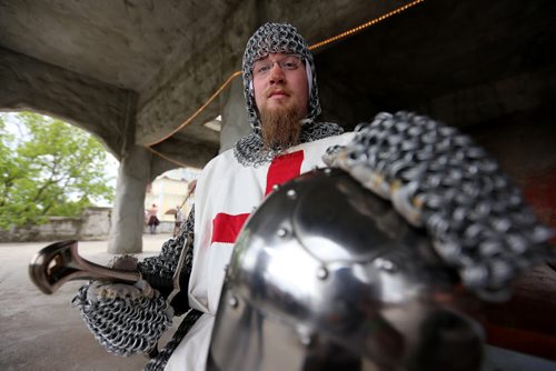 Adam Jones, a knight, wearing a 130lb chain mail suit of armour, at the Medieval Festival in Cooks Creek, Saturday, July 26, 2014. (TREVOR HAGAN/WINNIPEG FREE PRESS)