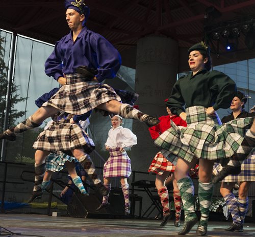 Scotland Pavilion's Ena Sutton Highland Dancers perform on the Festival Park Stage at the Forks on Saturday evening for Folklorama Kick-Off. Sarah Taylor / Winnipeg Free Press July 26, 2014