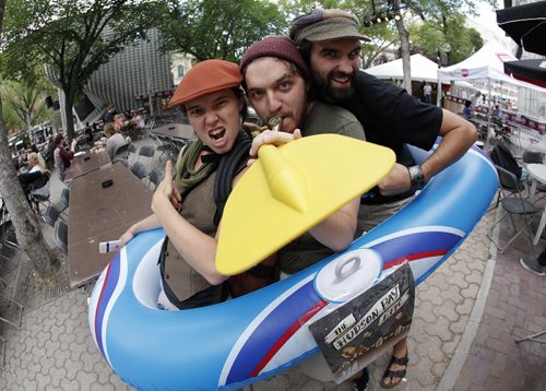 July 27, 2014 - 140727  -  Genevieve Pare, Ryan Reese, and Ian McFarlane promote their Fringe play The Hudson Bay Epic in the Exchange District on the final day of the Winnipeg Fringe Festival Sunday, July 27, 2014.  John Woods / Winnipeg Free Press