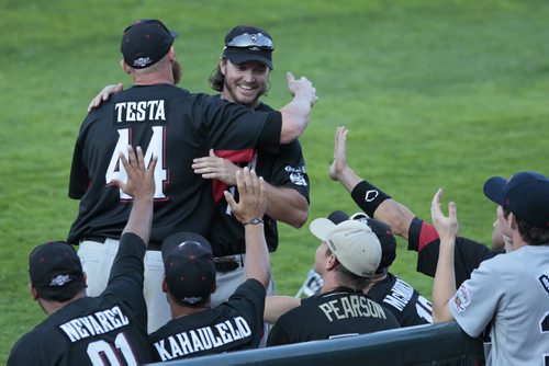 July 28, 2014 - 140728  -  Carlo Testa of the Wichita Wingnuts is congratulated by his team for winning the Fastest Baserunner at the All Stars Skills Competition in Winnipeg Monday, July 28, 2014.  John Woods / Winnipeg Free Press