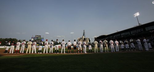 July 29, 2014 - 140729  - Teams line up for anthems prior to the 2014 American Association All-Star game in Winnipeg Tuesday, July 29, 2014.  John Woods / Winnipeg Free Press