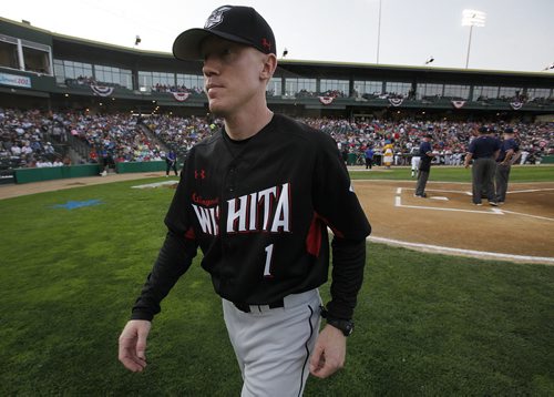 July 29, 2014 - 140729  -  Team South manager Kevin Hooper heads to his bench in the 2014 American Association All-Star game in Winnipeg Tuesday, July 29, 2014.  John Woods / Winnipeg Free Press