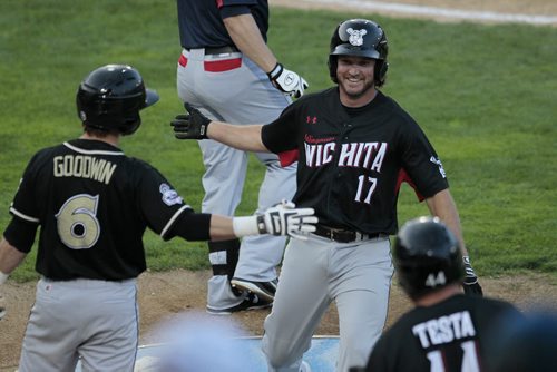July 29, 2014 - 140729  -  Witchita Wingnuts number 17 hits a homer  in the 2014 American Association All-Star game in Winnipeg Tuesday, July 29, 2014.  John Woods / Winnipeg Free Press