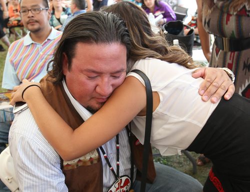 Derek Nepinakis hugged by family after being re-voted in the first ballot as the Grand Chief for the Assemble of Manitoba Chiefs Wednesday afternoon See Alex Paul Story- July 30, 2014   (JOE BRYKSA / WINNIPEG FREE PRESS)