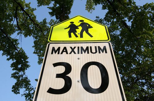 New 30 Km/hr school zone signs in Winnipeg that take effect this September 01, 2014- These signs have been recently erected on Burrows Ave for upcoming school year For Files- Please Credit- Aug 01, 2014   (JOE BRYKSA / WINNIPEG FREE PRESS)
