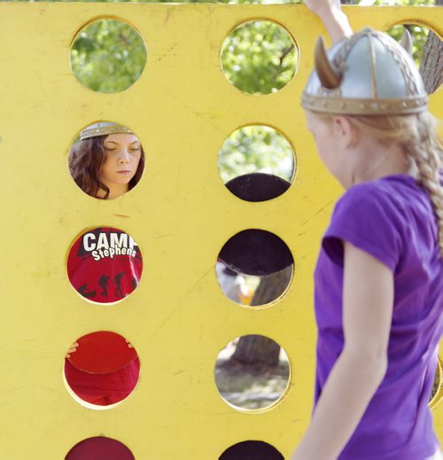Jema Zeren (left) and Lyneah Berg play a life-sized game of Connect Four at the Icelandic Festival of Manitoba in Gimli on Saturday. Sarah Taylor / Winnipeg Free Press August 02, 2014