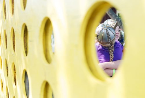 Best friends Jema Zeren (left) and Lyneah Berg play a life-sized game of Connect Four at the Icelandic Festival of Manitoba in Gimli on Saturday. Sarah Taylor / Winnipeg Free Press August 02, 2014