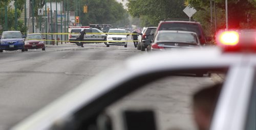 Winnipeg Police investigate the reported early morning assault on Selkirk Ave. Tuesday morning. Police closed Selkirk Ave. at Sinclair Ave. and Battery Ave. Wayne Glowacki/Winnipeg Free Press Aug.5 2014