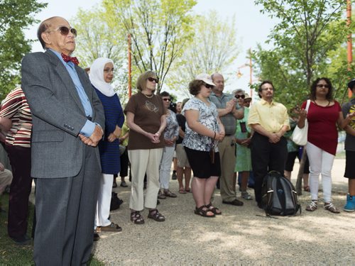 President of Mahatma Gandhi Centre of Canada Dr. K Dakshinamurti gather with multi-faith and human right groups for a circle of silent contemplation at the Forks Gandhi statue onTuesday afternoon to reflect on the violence happening in places such as Gaza, Ukraine and support peace. Sarah Taylor / Winnipeg Free Press August 5, 2014