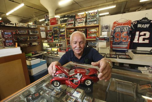 Dave Sanderson story on Thirsty's Flea Market,  Photo's of Ed Boyechko (die-cast cars) and sports collector items.    Aug 02, 2014 Ruth Bonneville / Winnipeg Free Press
