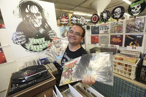 Dave Sanderson story on Thirsty's Flea Market,  Photo of  John McGowan (vintage vinyl)     Aug 02, 2014 Ruth Bonneville / Winnipeg Free Press
