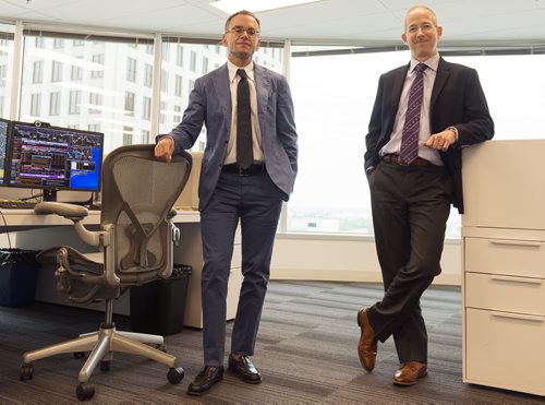 Tetrem Capital Management CEO Danny Bubis (left) and company shareholder and portfolio manager Alec MacIsaac stand in their office at 201 Portage Avenue. The ten year-old firm manages a $5.8 billion portfolio. Sarah Taylor / Winnipeg Free Press August 7, 2014