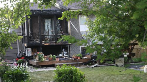 It was reported an overnight fire damaged a deck and home in the 100 block of Alburg Dr.  Wayne Glowacki/Winnipeg Free Press August 8 2014