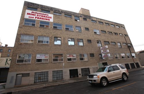 A five story building at 49 Adelaide St.one of two Exchange District warehouses that Sandhu Developments is converting to apartment blocks.  See story and other photos. See Murray McNeil story. August 8, 2014 - (Phil Hossack / Winnipeg Free Press)