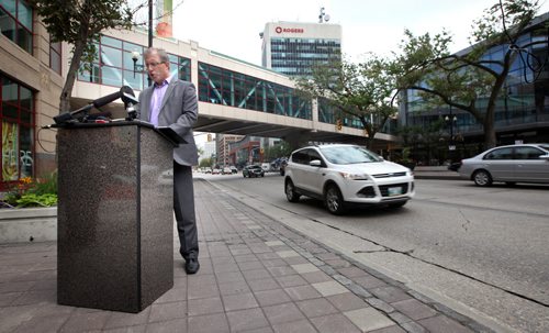 Mayoral candidate Gord Steeves made a downtown policy announcement Friday afternoon on Portage Avenue between Carlton Street and Edmonton. See story and other photos. See Bart Kives story. August 8, 2014 - (Phil Hossack / Winnipeg Free Press)
