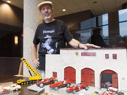 Ferrari fan Harald Vodtke brought his cars and . He created all the buildings and sculptures on display with the cars at the Winnipeg Diecast Group's meeting at Pony Corral on St. Mary's Avenue on Thursday evening. Sarah Taylor / Winnipeg Free Press August 7, 2014