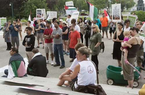 Supporters came out to the Legislative Building on Saturday to rally for Gaza. Winnipeg has held four rallies for Gaza in the past three weeks. Sarah Taylor / Winnipeg Free Press August 9, 2014