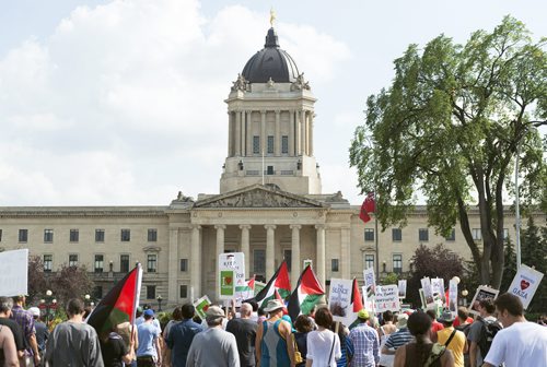 Supporters came out to the Legislative Building on Saturday to rally for Gaza. Winnipeg has held four rallies for Gaza in the past three weeks. Sarah Taylor / Winnipeg Free Press August 9, 2014