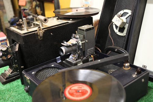 Thirsty's Flea Market on Ellice has eclectic vintage goods.   See Dave Sanderson story.  Picture phone - probably used in schools like a projector, projecting images while a record plays describing the images.   Aug 09, 2014 Ruth Bonneville / Winnipeg Free Press