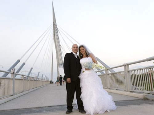 Gerald Lavergne and Shelley Carlson-Lavergne tied the knot on Saturday at the Esplanade Riel Bridge. They are the first couple to wed there. Sarah Taylor / Winnipeg Free Press August 9, 2014