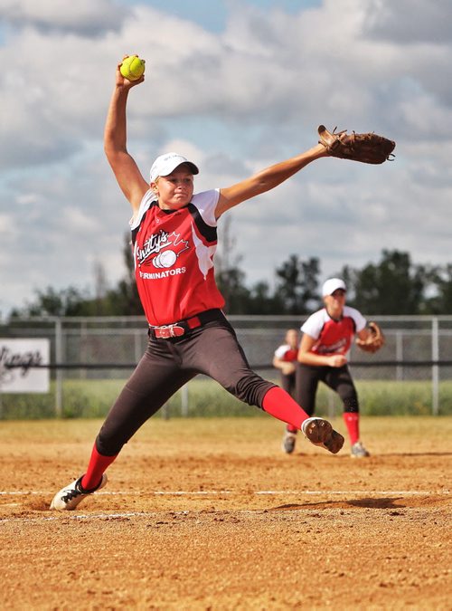 Smitty's Junior pitcher Regan Lawrence winds up against the Smitty's Senior team during the bronze medal game of the Softball Canada's Senior Women's Championship finals at John Blumberg Softball Complex Sunday.  140810 August 10, 2014 Mike Deal / Winnipeg Free Press