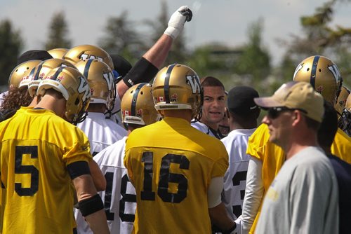 Winnipeg Blue Bombers' Nick Moore (17) in the pre-practice huddle at Bison Field Sunday afternoon. 140810 - Sunday, August 10, 2014 -  (MIKE DEAL / WINNIPEG FREE PRESS)