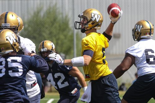 Winnipeg Blue Bombers' QB Drew Willy (5) during practice at Bison Field Sunday afternoon. 140810 - Sunday, August 10, 2014 -  (MIKE DEAL / WINNIPEG FREE PRESS)