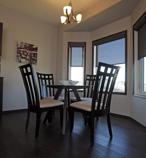 eating area in kitchen .News Homes . 187 Lake Bend Rd. story by Todd Lewys . Aug 11 2014 / KEN GIGLIOTTI / WINNIPEG FREE PRESS