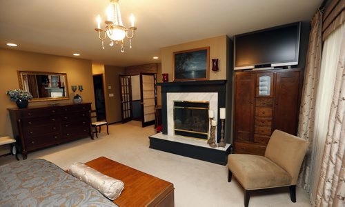 master bedroom fireplace , Homes ,luxury home in  La Salle Mb. At 50 Kingswood Drive  story by Todd Lewys . Aug 12 2014 / KEN GIGLIOTTI / WINNIPEG FREE PRESS