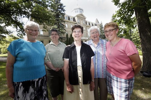 FAITH - Sisters of the Holy Names of Jesus and Mary  celebrate 140 years in Manitoba at St. Mary's Academy, Wellington/Academy  LtoR  ** all Sisters as in nuns , Sister  Johanna Jonker  , Charlotte Leake , Leonne Dumesnil ,Mary Gorman , Michelle Garlinski ,  .story by  Brenda Suderman Aug 12 2014 / KEN GIGLIOTTI / WINNIPEG FREE PRESS
