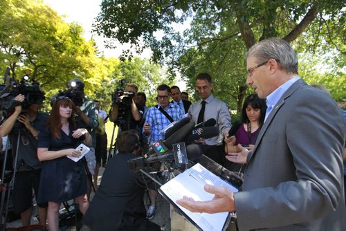 Mayoral candidate Gord Steeves heard questions from the media and individuals attending his announcement Tuesday at Bonnycastle Park. Dan Lett/Kevin Rollason stories Wayne Glowacki/Winnipeg Free Press August 12 2014