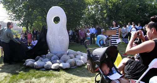 About 150 people including family of missing and murdered indigenous women and girls attended the monument unveiling ceremony  by the Oodena Circle at The Forks Tuesday. see web story  Wayne Glowacki/Winnipeg Free Press August 12 2014