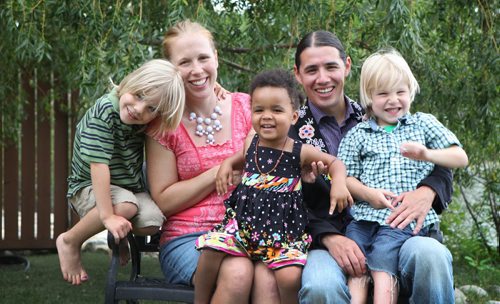 Mayoral candidate Robert Falcon Oullette with his wife Catherine (Cantin) along with his children - daughter Abigaelle (2yrs), Edward-5yrs (Green Striped shirt) and Julien-4yrs (plaid, jean shorts).  Also, they have two older children not in the photo - Xavier - 9 yrs and Jacob - 7 yrs.   Aug 12, 2014 Ruth Bonneville / Winnipeg Free Press