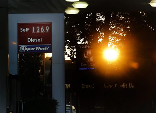 Stdup . The sunrise brought high higher gas prices  as pump prices jumped eight cents .Aug 13 2014 / KEN GIGLIOTTI / WINNIPEG FREE PRESS