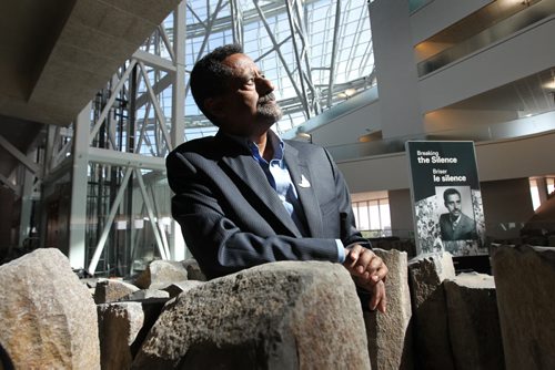 Ali Saeed, a victim of  Ethiopia's Red Terror, reflects and prays in the Garden of Contemplation in the centre of the Canadian Museum for Human RIghts amidst towering windows, large boulders and tragic memories.  Saeed  was tortured. imprisoned and forced out of his homeland because of his efforts to support Freedom of Speech.  His story will be one of many tragic events in history to be displayed in a installation at the museum this fall.  See story.   Aug 13, 2014 Ruth Bonneville / Winnipeg Free Press