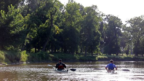 Brett Bourne and Phil Marriott, kayakers on the La Salle River at La Barriere Park, Wednesday, August 13, 2014. (TREVOR HAGAN/WINNIPEG FREE PRESS)