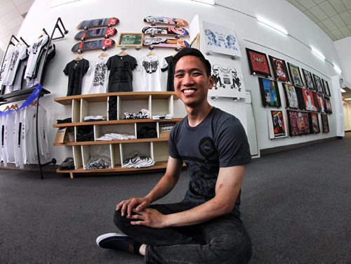 Artist Jonathan Seah has opened a Pop-Up store at the corner of Graham Avenue and Vaughn Street called Chook Clothing Company. The urban youth store at 438 Graham which will be open until September 22 features a skateboard ramp and will sell t-shirts and other merchandise and hold gallery events.  140814 August 14, 2014 Mike Deal / Winnipeg Free Press