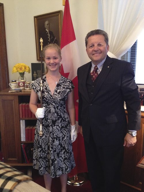 Usher of the Black Rod, Superintendent Greg Peters gives Eva Rodrigues, 15,  a private tour of the Senate after she did a history project on the Usher of the Black Rod role. August 14, 2014 (Mia Rabson / Winnipeg Free Press)