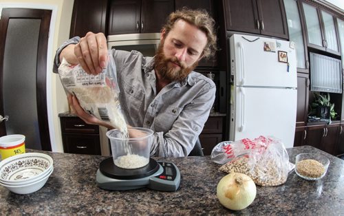 Colin Vandenberg volunteers his time to raise money and awareness for the New Life Center in Malawi. To do this, Colin is currently living on $1 of food a day for a month. 140814 - Thursday, August 14, 2014 -  (MIKE DEAL / WINNIPEG FREE PRESS)