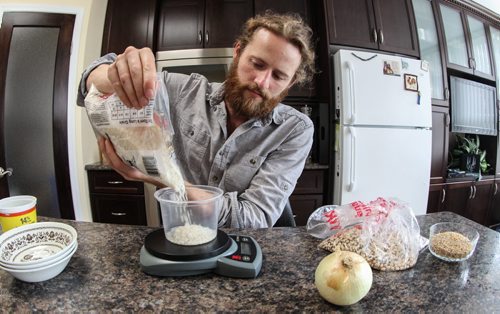 Colin Vandenberg volunteers his time to raise money and awareness for the New Life Center in Malawi. To do this, Colin is currently living on $1 of food a day for a month. 140814 - Thursday, August 14, 2014 - (MIKE DEAL / WINNIPEG FREE PRESS)