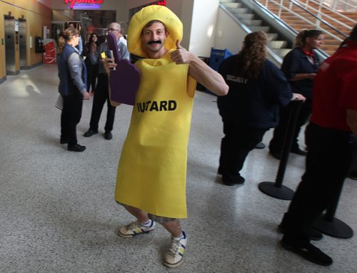 Arcade Fire Fans arrive in "mandatory dress" for a night of song and celebration. August 14, 2014 - (Phil Hossack / Winnipeg Free Press)