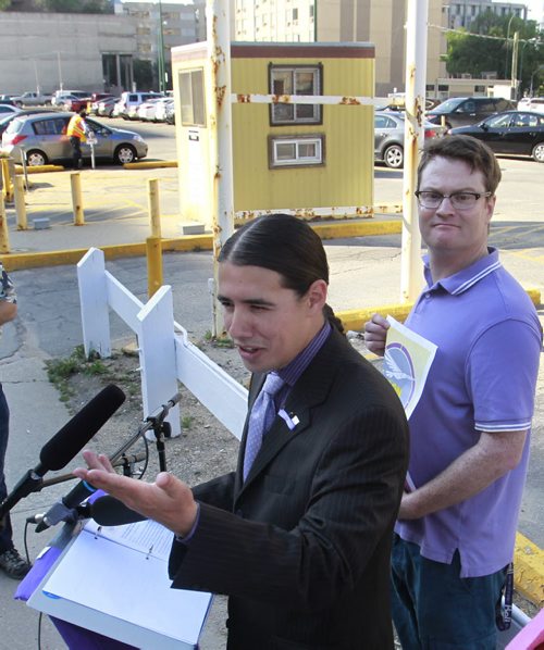 Robert-Falcon Ouellette on Donald Street for his announcement titled Part 2 of Fiscal Plan to put Citys Finances Back on Track, Creating a Better Downtown for Everyone.  Kevin Rollason story.Wayne Glowacki/Winnipeg Free Press August 15 2014