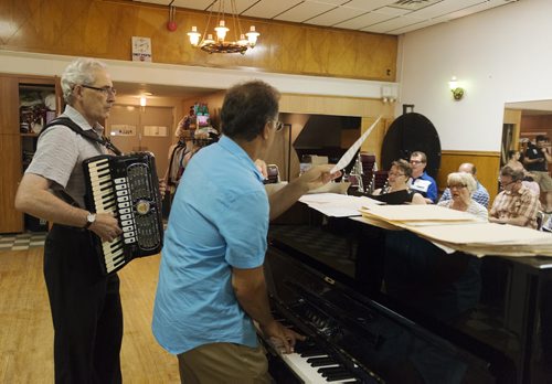 Henry Zuzia and music director Tadeusz Biermacki rehearse with the Sokol Folk Choir at the Old Sokol Hall. Sarah Taylor / Winnipeg Free Press August 7, 2014