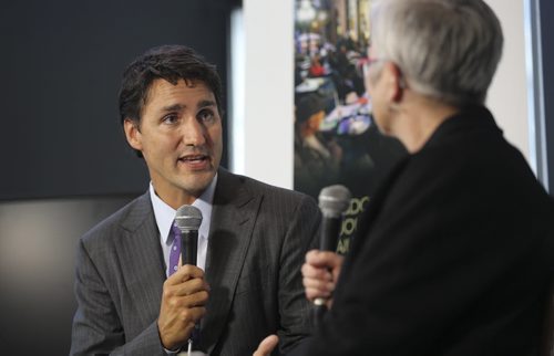 Liberal Party Leader, Justin Trudeau speaks to Shannon Sampert, the new Politics and Perspectives editor, at the Winnipeg Free Press News Cafe, Friday, August 15, 2014. (TREVOR HAGAN/WINNIPEG FREE PRESS)