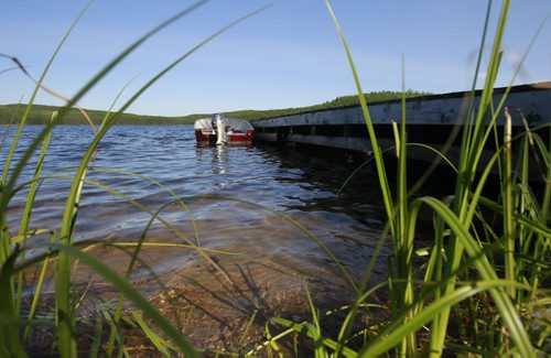 This is lake # 239 with dock and boat uesed by researchers, part of the Experimental Lakes Area (ELA) located past Kenora in Northwestern Ontario. Nick Martin story Wayne Glowacki/Winnipeg Free Press August 14 2014
